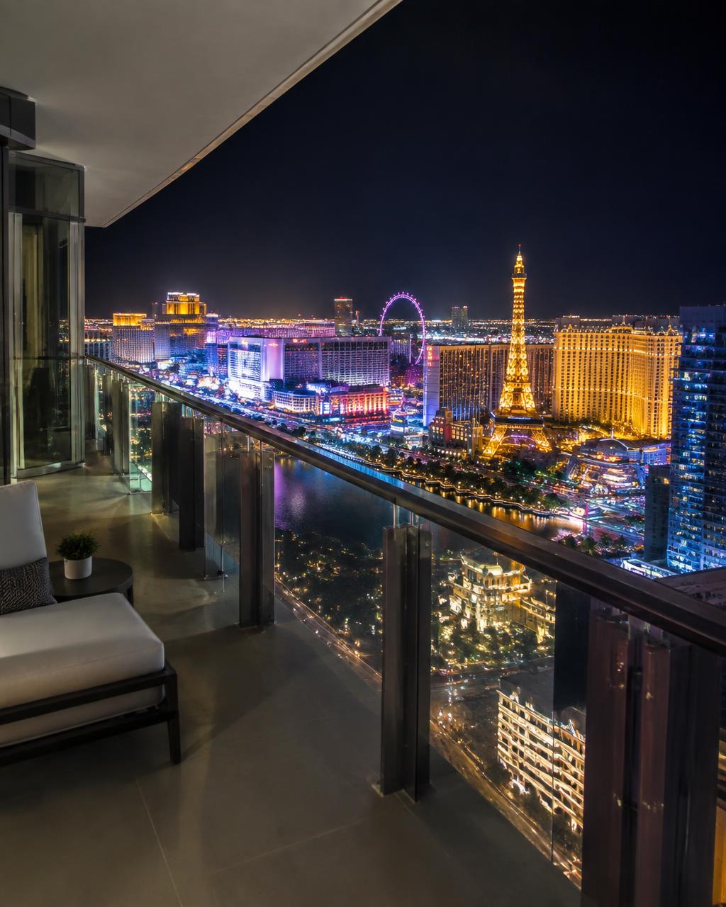 High-rise condo balcony view over the Las Vegas strip at night
